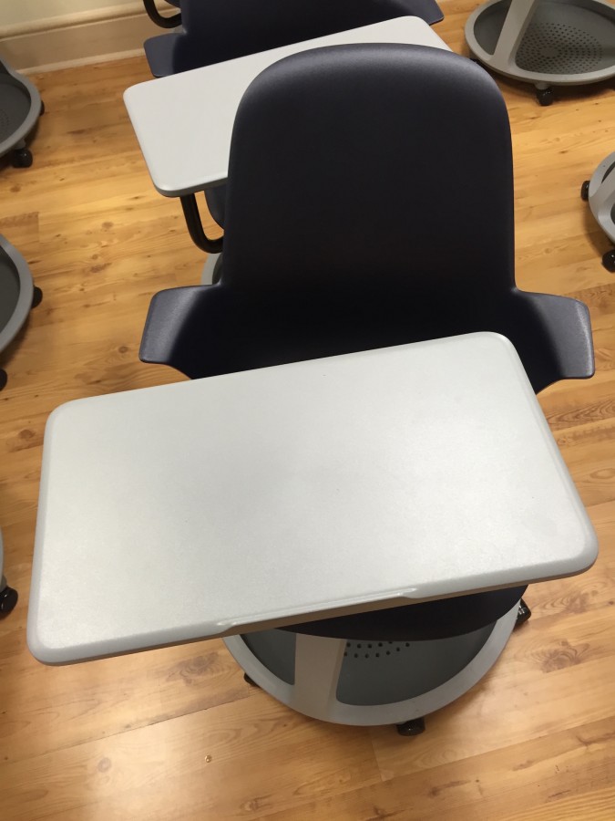 The new desk feature a spinning seat, a space for backpacks, armrests, a rounded seat, and most importantly wheels.