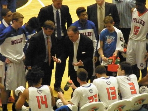 Coach Candelino speaks to the team during a timeout.