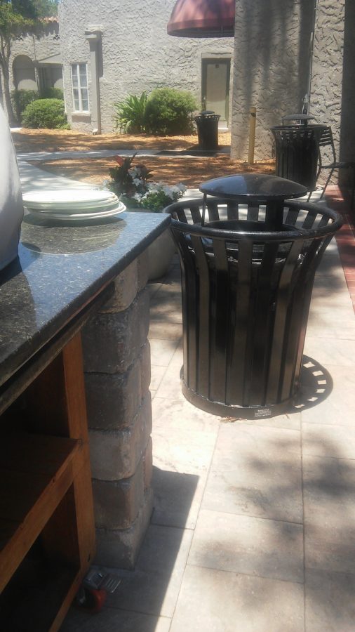 Students often leave their plates on the patio by the trash cans rather than the cleaning stations inside.