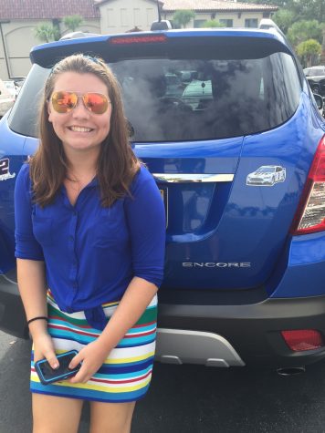 Sydney Schmidt '17 poses for a photo with her car (and NASCAR bumper sticker)!