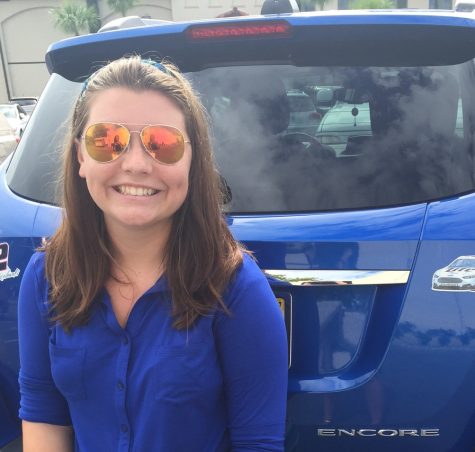 Sydney Schmidt '17 poses for a photo with her car (and NASCAR bumper sticker)!