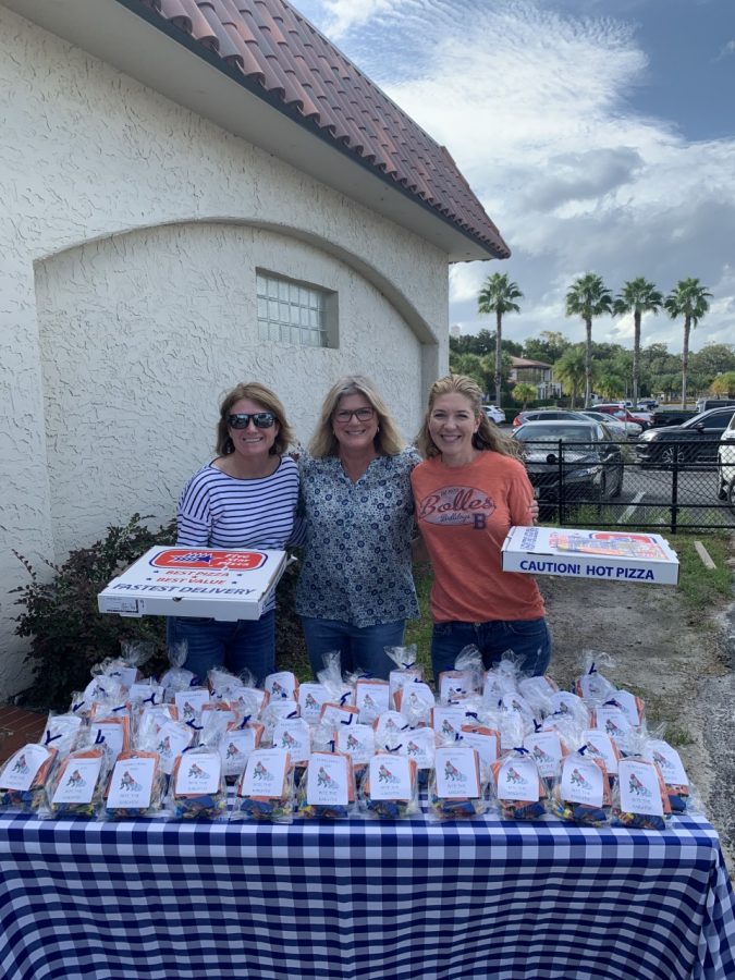 For Homecoming week, the moms brought pizza and treats for the football team.