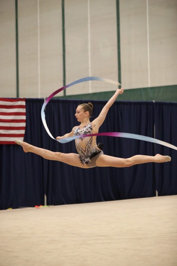 Chugay performs her rhythmic gymnastics routine.